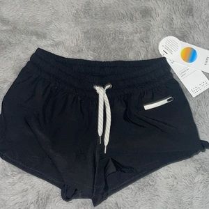 Black running shorts